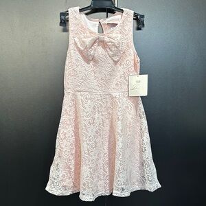 Duchess Lace Overlay, lined, bow front, keyhole button back,sleeveless dress